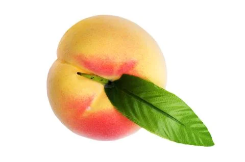 Plastic peach on white macro Stock Photos