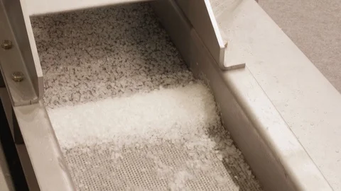 Plastic pellets in pelletizer which recycles plastic waste Stock Footage