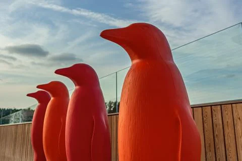 Plastic penguin several in a row Stock-Fotos