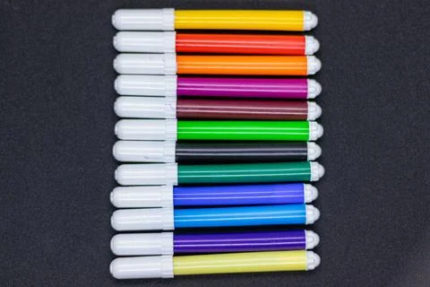 Plastic Pens with Caps in Multiple Colors Stock Photos