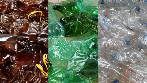 Plastic PET bottle recycle. Brown green and clear colour-sorted PET bottles 스톡 동영상 229593195
