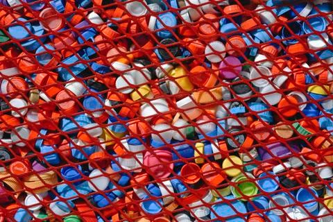 Plastic pet caps texture of various colors Fotos de archivo