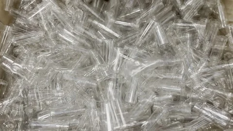 Plastic pet preforms. Raw material for bottles. Stock Footage 265787641