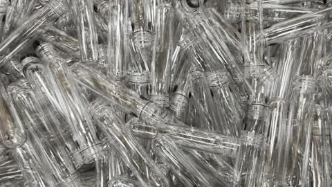 Plastic pet preforms. Raw material for bottles. Stock Footage 265788229