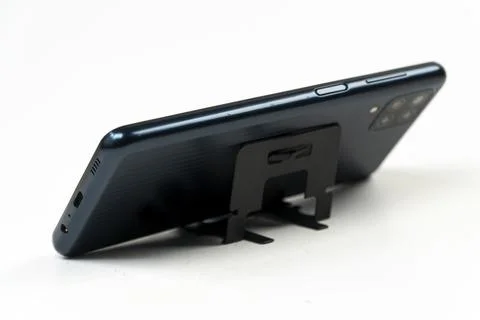 Plastic phone stand isolated on white background Stock-Fotos