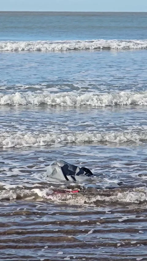 Plastic piece polluting beach Stock Footage 330734472