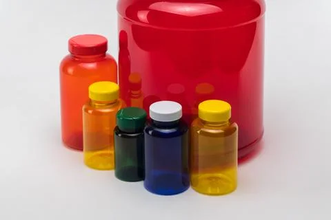 Plastic pill jars Stock Photos