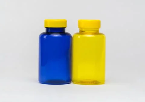 Plastic pill jars Stock Photos