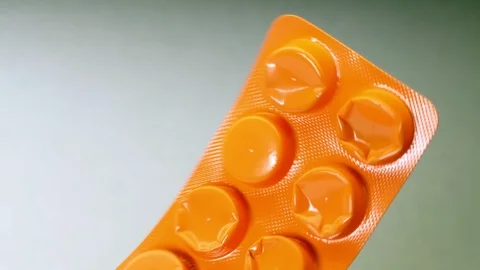 Plastic pill packaging, rotation, white background Stock Footage 123925553