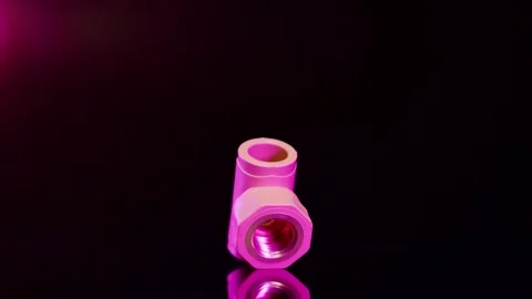 Plastic Pipe Fitting Rotating On Black Background, Studio Product Shot Stock Footage 342318606