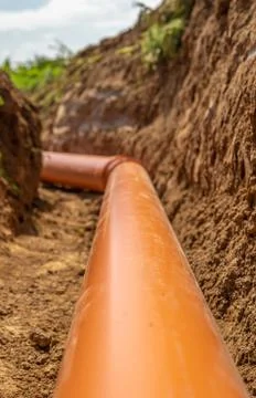 Plastic pipes in the ground during the construction of a building, bunner with 스톡 사진