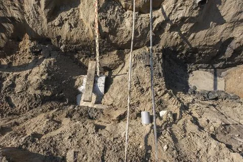 Plastic pipes in the ground during the construction of a building Stock Photos
