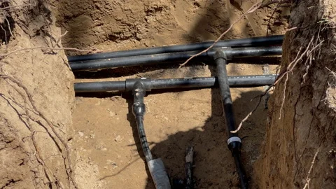 Plastic pipes laid in trenches. Close up Stock Footage 201770017