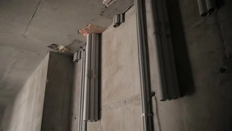 Plastic pipes in the wall Stock Footage 142285391