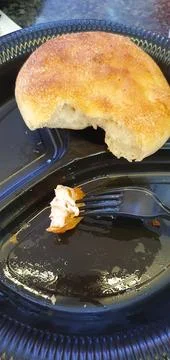 On a plastic plate bread chicken meat on a fork (2) Stock Photos