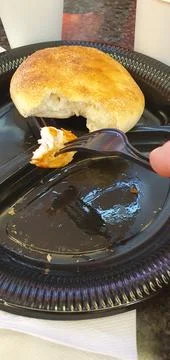 On a plastic plate bread chicken meat on a fork (4) Stock Photos