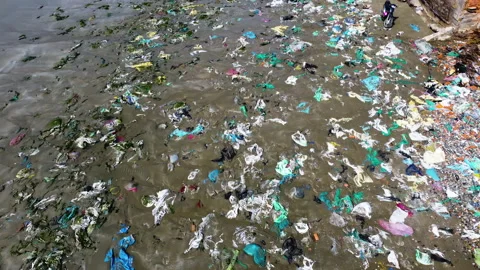 Plastic pollution on beach and in ocean in Vietnam. Most polluted beach, 動画素材 166512547