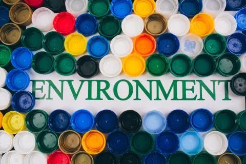 Plastic pollution concept. Be plastic free. Word Environment in the center of Stock Photos