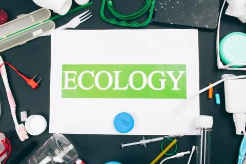 Plastic pollution concept. Save marine ecology. Paper with word Ecology in the Stock Photos