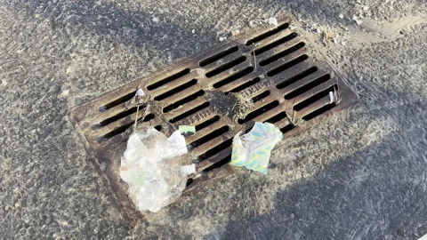 Plastic pollution in drainage system in the city Stock Footage 331461140