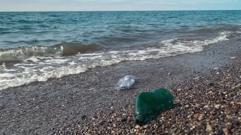 Plastic pollution environmental problem. Plastic bottles, bags and other garbage Stock Footage 110729252