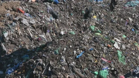 Plastic pollution in landfills and garbage. Video stock 162352964