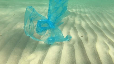 Plastic pollution in ocean environmental problem. Bags dumped in sea Stock Footage 94997824