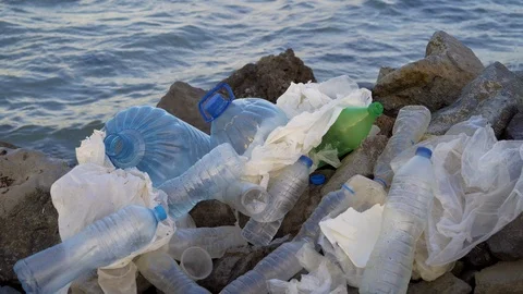 Plastic pollution in ocean environmental problem. Plastic cups,carrier bags Stock Footage 102417316