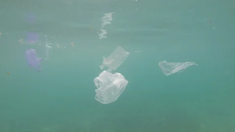 Plastic pollution in ocean Stock Footage 88610038