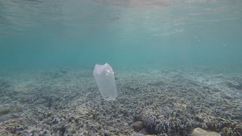 Plastic pollution in ocean Video stock 89859323