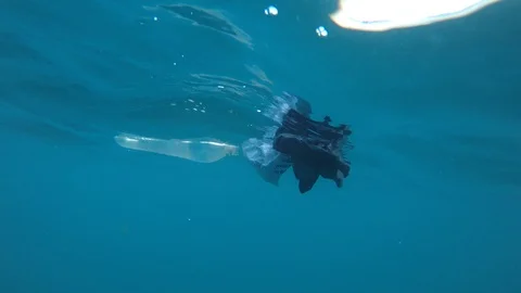 Plastic pollution in ocean Stock Footage 115880791