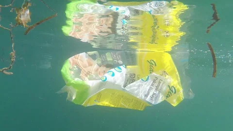 Plastic pollution in ocean Stock Footage 123286402