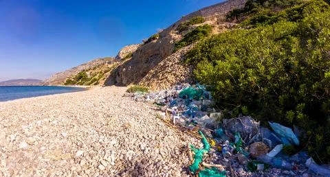 Plastic Pollution On Pebble Beach 库存照片