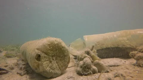 Plastic Pollution pollutants and plastic debris video footage 4k. 動画素材 334660393