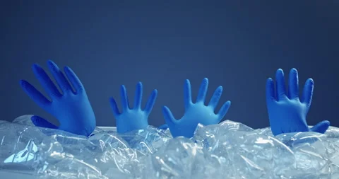 Plastic pollution save earth gloves bottles pile Stock Footage 146268253