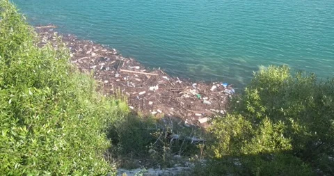 Plastic pollution trash with different kinds of garbage Stock Footage 148995183