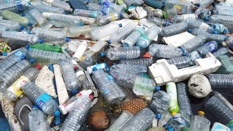 Plastic pollution trash in ocean with different kinds of garbage - plastic Stock Footage 115198801