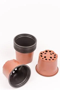 Plastic pots isolated on white background Stock Photos