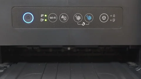Plastic printer is cleaning its nozzles, indicated by the control panel lights. Stock Footage 320889473