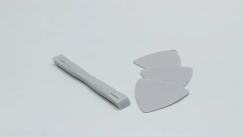 Plastic pry tools isolated on white background Stock Photos