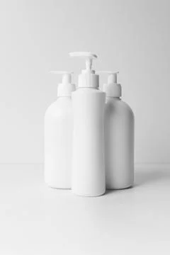 Plastic pump for liquid soap, without labels, on a white background Stock-Fotos