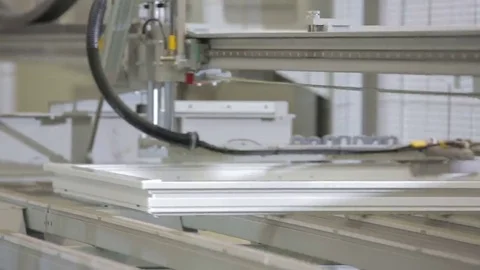 Plastic PVC windows factory - window frame moved by a machine Stock Footage 69122504