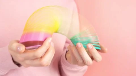 Plastic rainbow toy in hands. Stock Footage 152628447