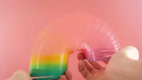 Plastic rainbow toy in hands. Stock Footage 152628556