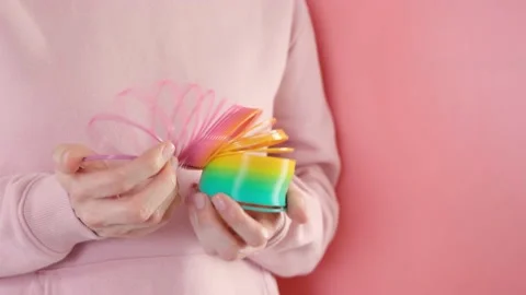 Plastic rainbow toy in hands. Stock Footage 152628601