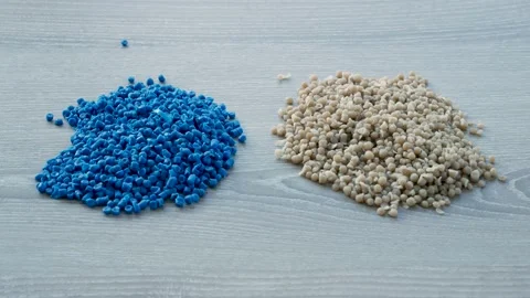 Plastic raw materials in granules for industry. Polymer resin. Video stock 233384534