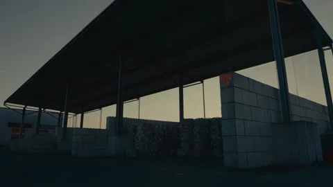 Plastic Recycling Facility Storage Area with Large Compressed Waste Bales Vidéo 331166548