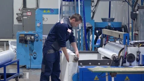 Plastic recycling plant. Recycling plastic into household polyethylene bags. Stock Footage 306054853