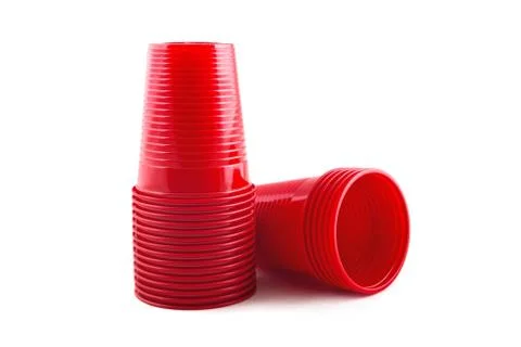 Plastic red cups stack on white background 库存照片
