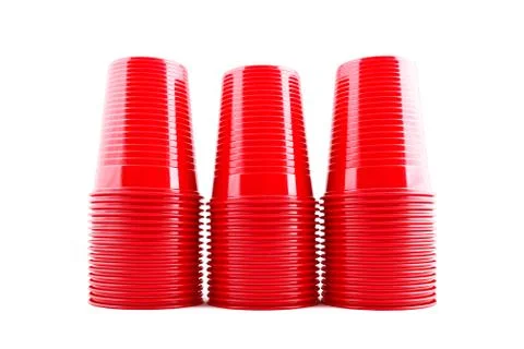 Plastic red cups stack on white background 库存照片